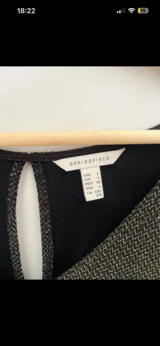 Vestido elegante negro y dorado