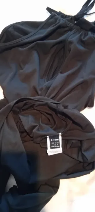 Macacão preto com cinto