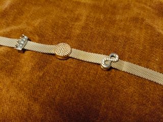 Bracciale Pandora Reflections con 3 Charms