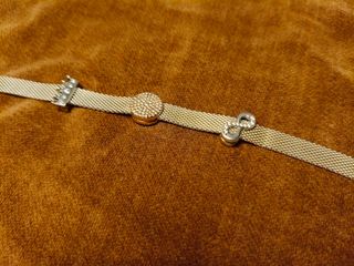 Bracciale Pandora Reflections con 3 Charms