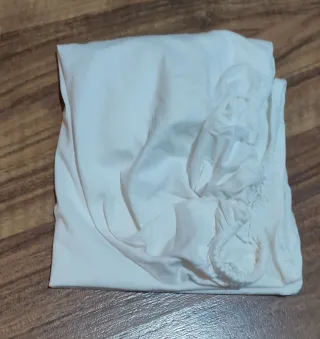 Protettrice per fasciatoio o culla per neonato