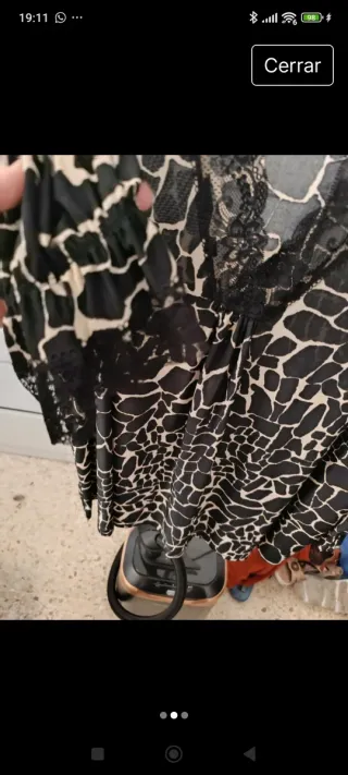 Blusa tipo lencera estampado animal