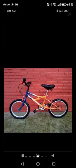 Bicicleta infantil naranja y azul