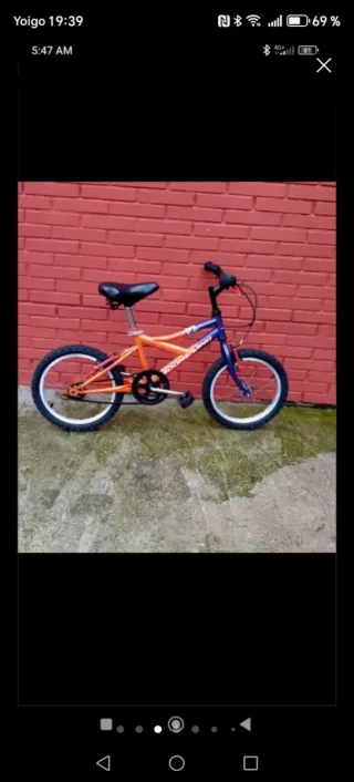 Bicicleta infantil naranja y azul