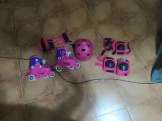 Patines y equipo de protección rosa talla 30