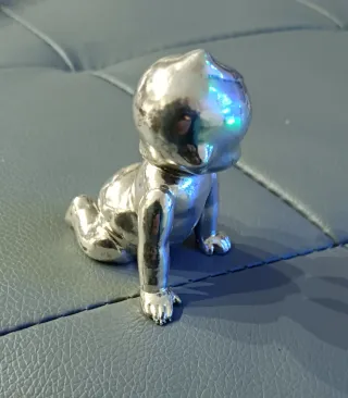 Piccolo Kewpee portafortuna placcato in Argento