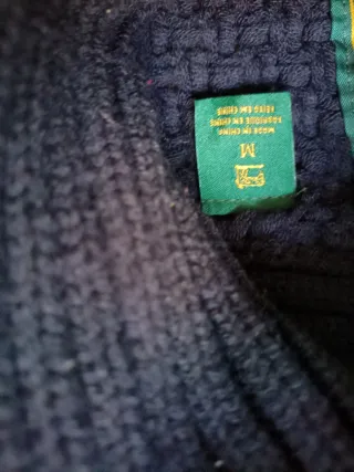 Jersey azul cuello alto tejido