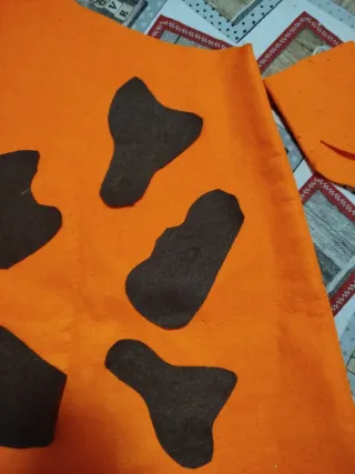 Disfraz infantil troglodita naranja