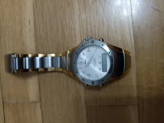 Reloj WORLD oro y plata