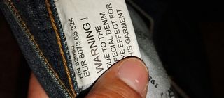 Bermudas Karl Kani Azul con Bordado Dorado