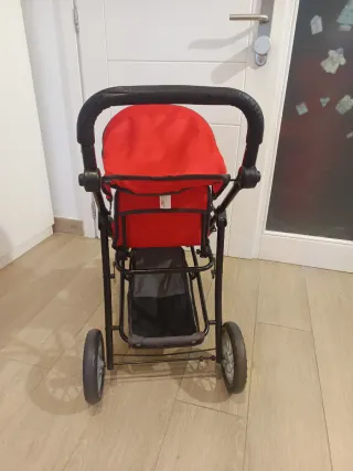 Carrito gemelar para muñecas rojo