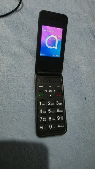 Alcatel - Telefono cellulare nero con design classico e funzionale