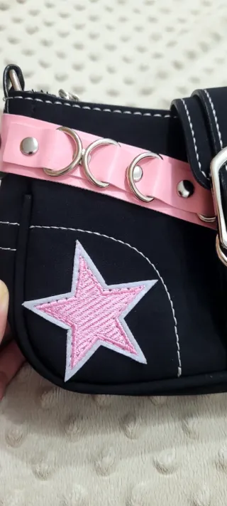 Cartera para niña negra con estrellas rosas