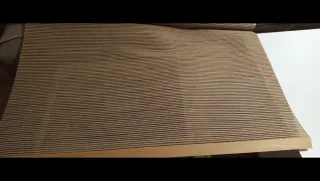 Tenda a rullo beige e marrone