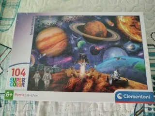 Precintado. Puzzle planetas