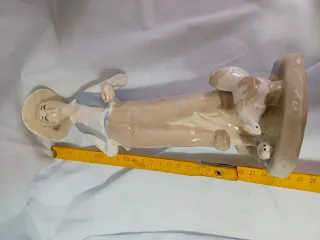 Figura porcelana pastor con gallina