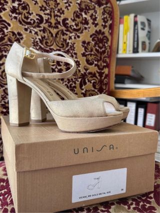 Sandalias Unisa doradas talla 36