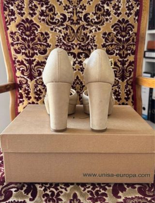 Sandalias Unisa doradas talla 36