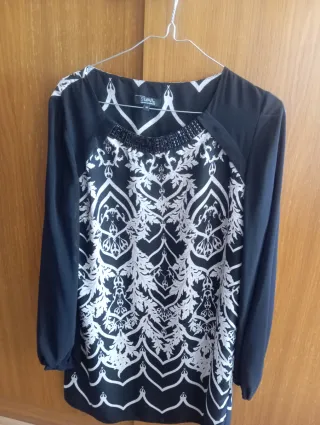 Vestido estampado Star talla XL.pero da poca talla