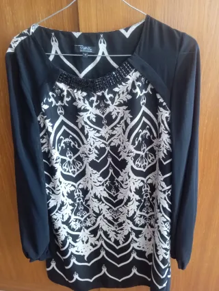 Vestido estampado Star talla XL.pero da poca talla