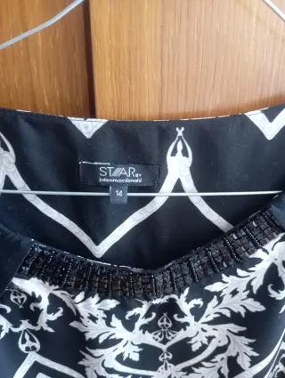 Vestido estampado Star talla XL.pero da poca talla