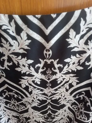 Vestido estampado Star talla XL.pero da poca talla