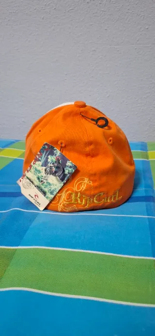 Gorra Rip Curl Naranja y Blanca