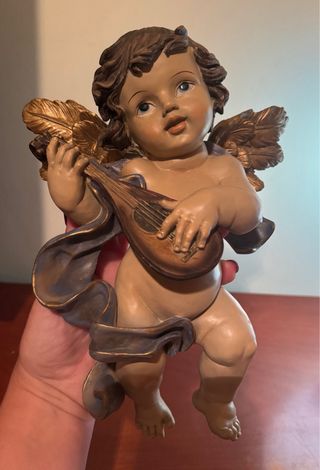 Figure di Angeli con Strumenti Musicali