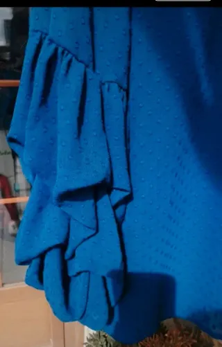 Blusa H&M azul con volantes