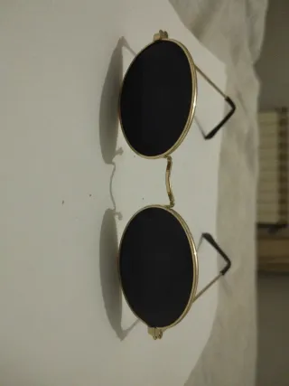 Gafas de sol redondas vintage doradas