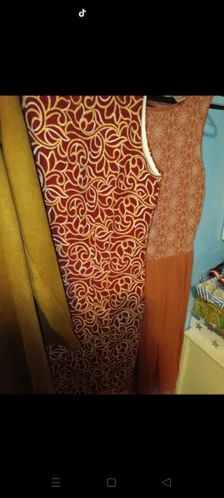 Chaqueta y 2 vestidos mujer poco uso.