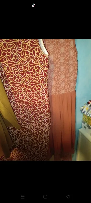 Chaqueta y 2 vestidos mujer poco uso.