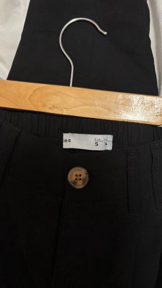 Pantalón de pinzas negro