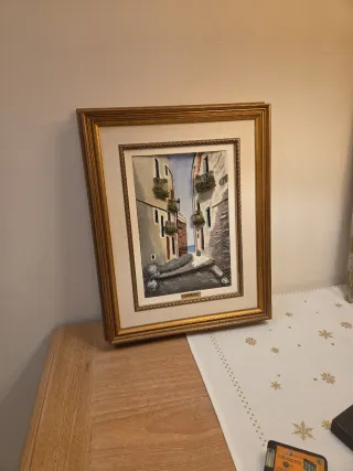 Quadro decorativo con cornice dorata