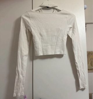 Top blanco manga larga con aberturas