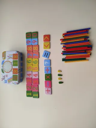 Caja con varillas de cálculo y números