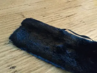 Scaldacollo in pelliccia sintetica nera