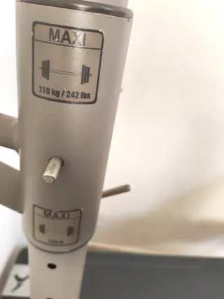 Banco de pesas multifuncional + Barra y discos