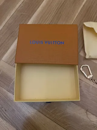 Monedero Louis Vuitton Damier Ebene con caja