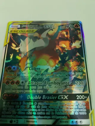 Reshiram y Charizard GX SM201