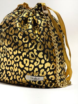 Bolso bombonera estampado leopardo