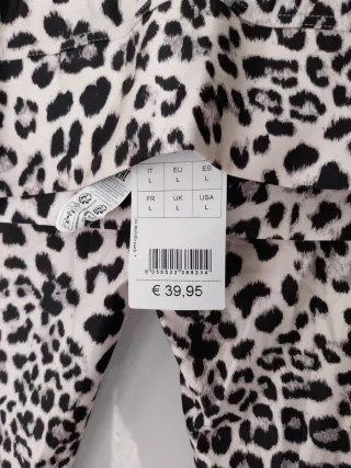 Pantalón pitillo estampado leopardo Talla L