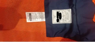 Chubasquero Decathlon niño T.14-15