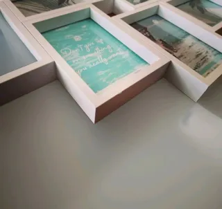 Cornice multipla in legno bianca