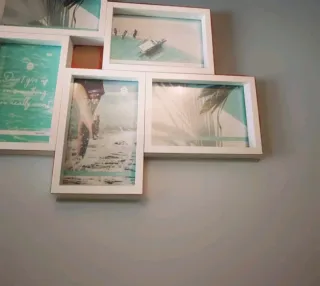 Cornice multipla in legno bianca