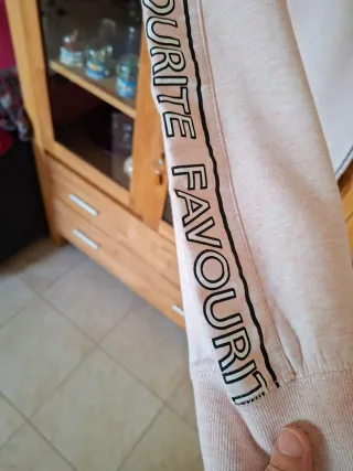 Tuta rosa con banda laterale