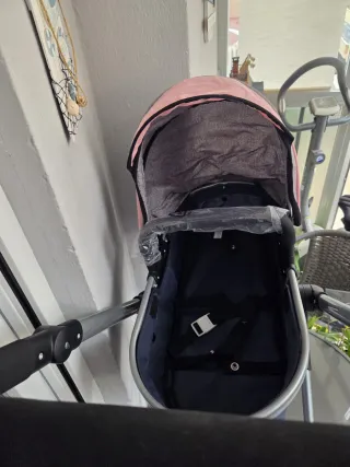 Cochecito muñecas+ Nenuco petuco