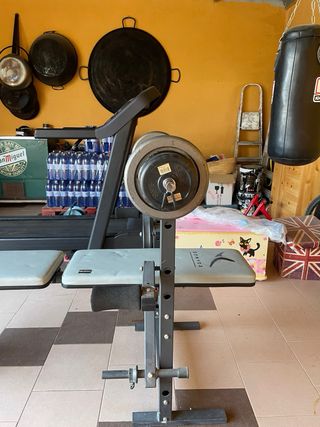 Banco de pesas con discos