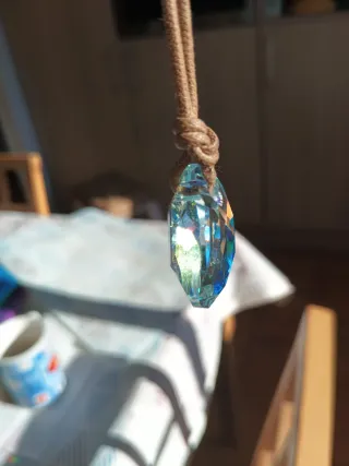 Colgante Swarovski original. Cordón marrón y rodio