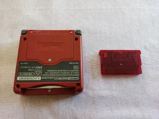 Game Boy Advance SP shell Groudon + Pokémon Rubino